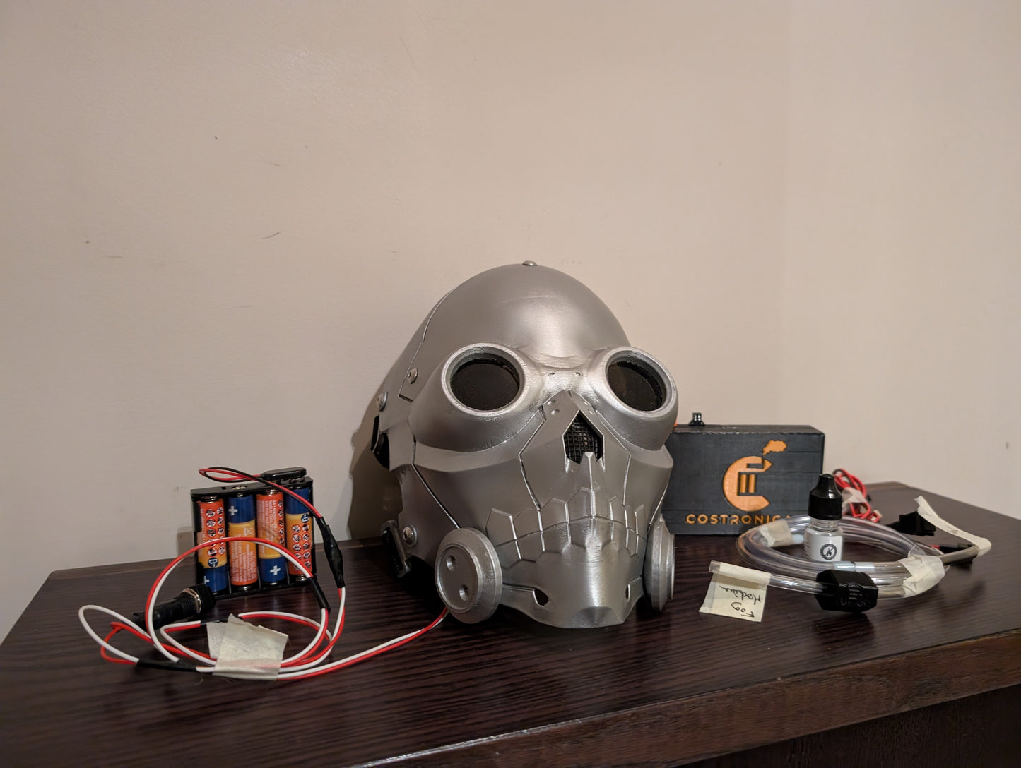 Death gun inspired helmet with fog machine and eye lights