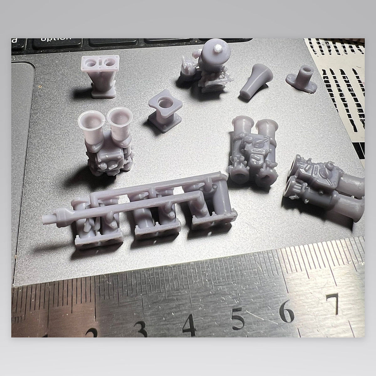 3d printed car pieces and engines for miniature model and RC cars.