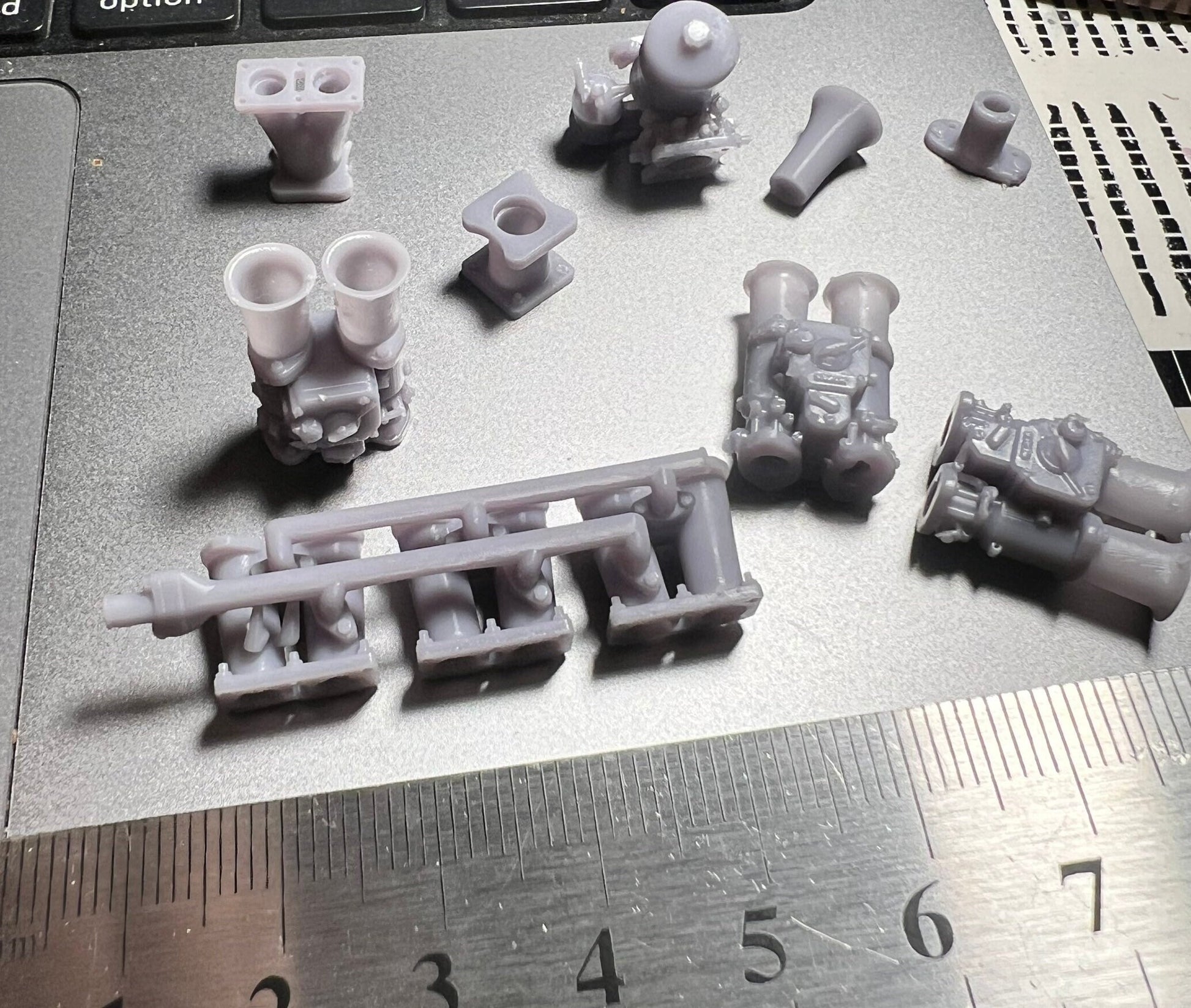 3d printed car pieces and engines for miniature model and RC cars.